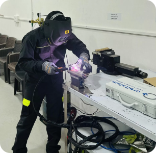 image 3 Welder in full PPE carrying out a TIG weld during orbital welding training in Ahmedabad