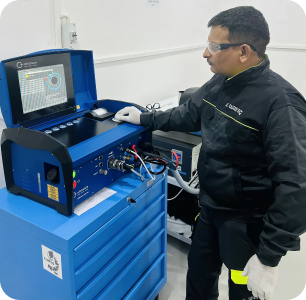 image 4 Instructor setting parameters on an orbital welding power source at the Awilli academy